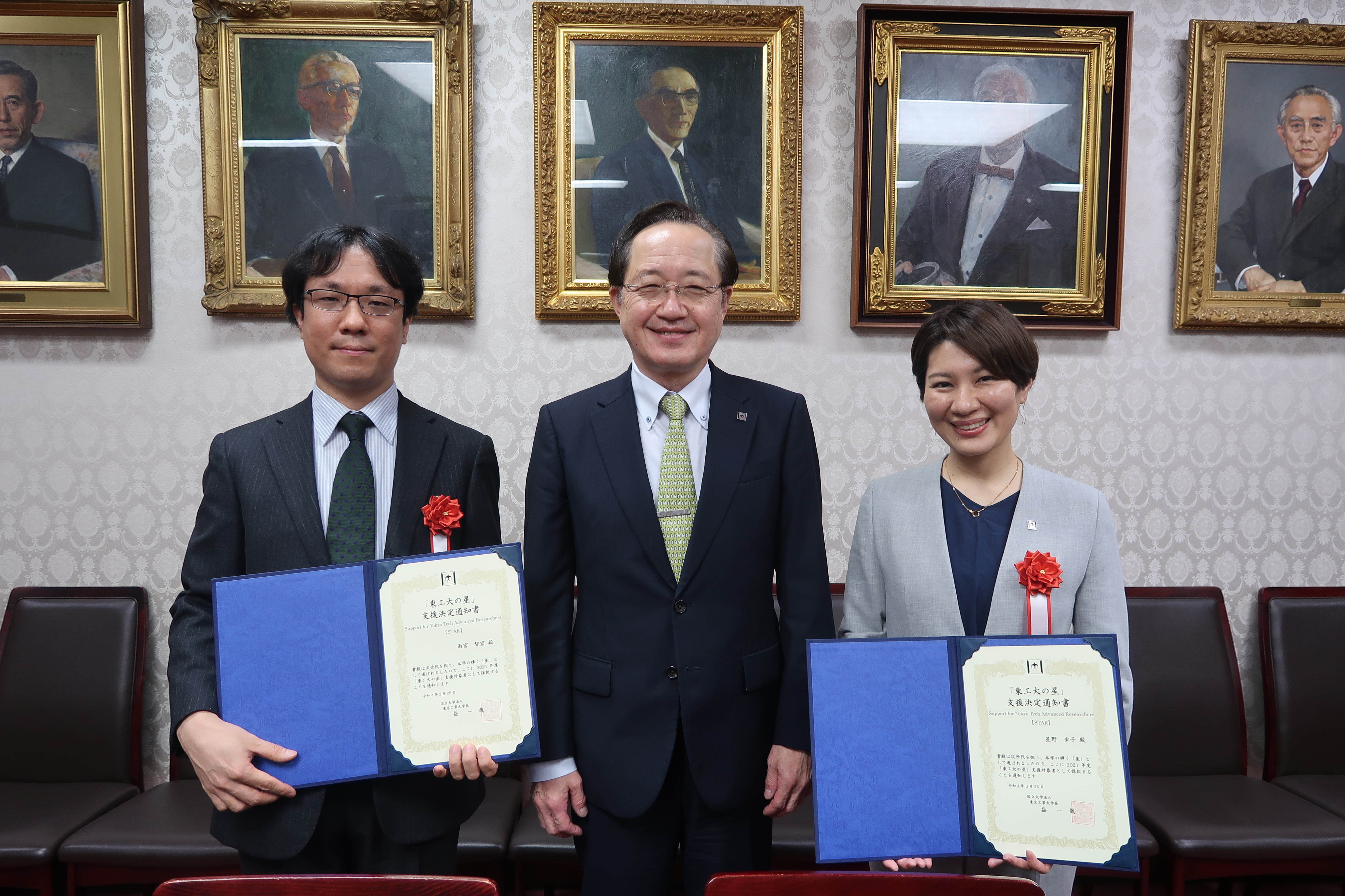 (counterclockwise from front left) Kitano, Inagi, EVP for Research Osamu Watanabe, President Kazuya Masu